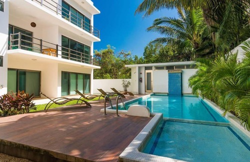 Villa Juarez Apartment | Paraiso304; Luxury condo 3 min walk to the beach.