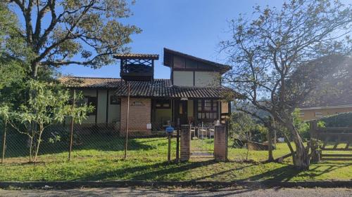 Jardim Flamboyant House | Pe na Pedra quarto 3