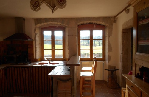 Saugeot Ski Chalet | Peace and space for this magnificent renovated farmhouse with fireplace.