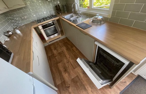 Tattershall House | Peaceful Lakeside Lodge LF with hot tub, private fishing peg situated Tattershall Lakes