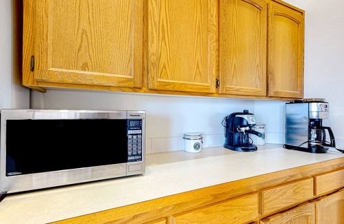 Oak Harbor House | Peek-a-boo ocean view home with in-law suite, fireplace, & outdoor space
