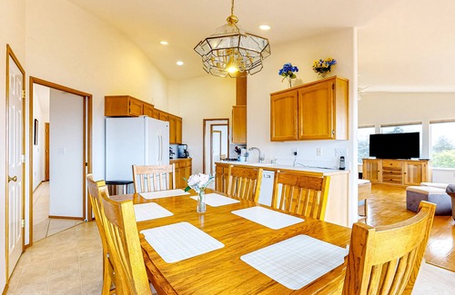 Oak Harbor House | Peek-a-boo ocean view home with outdoor living space, W/D, and balcony