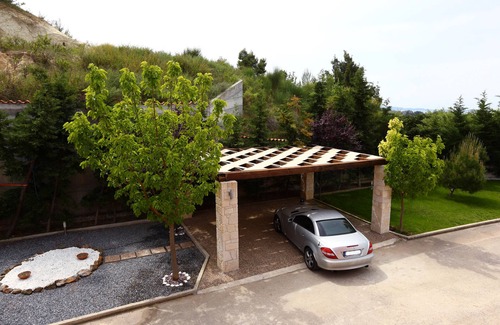 Pefkochori Villa | Pefkochori villa with a stunning panoramic view and a waterfall private pool.