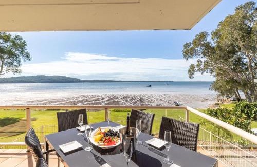 Soldiers Point Apartment | Pelican Sands 2 fantastic waterfront unit with pool and air conditioning