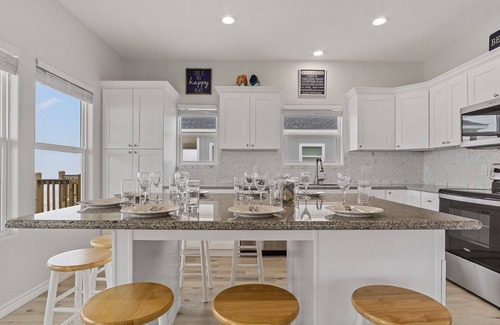 Gilchrist House | Pelican Shores: Sun, Sand, and Serenity – 3BR Beachfront Retreat!