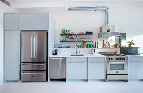 Hunters Point House | Penthouse w/large rooftop Manhattan skyline in 2 family Townhome