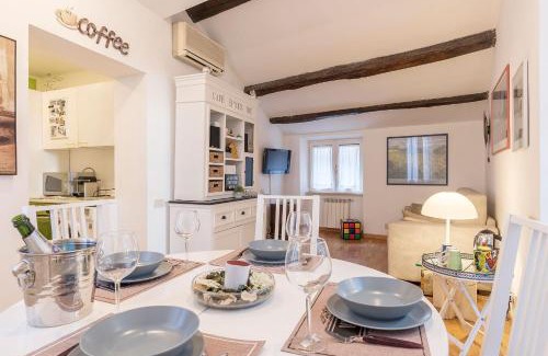 Rione XI Sant'Angelo Apartment | Penthouse with Terrace in the Heart of Rome