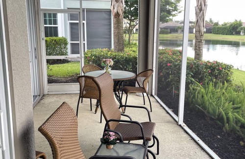 Rural Estates Condo | Perfect 2-bedroom 1st floor condo, with scenic lake view in charming Naples Fl.