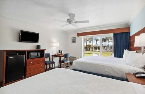 Neptune Beach Hotel | Perfect Beach Getaway: 4 Family Rooms, Outdoor Pool & Pet-Friendly