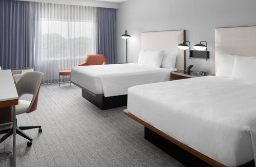 Oldsmar Hotel | Perfect for Families! 4 Queen Rooms with Wi-Fi, Gym Access & Outdoor Pool!