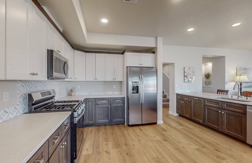 Rio Rancho House | Perfect for you! New 4 BR/3BA with open floor plan. Includes garage.