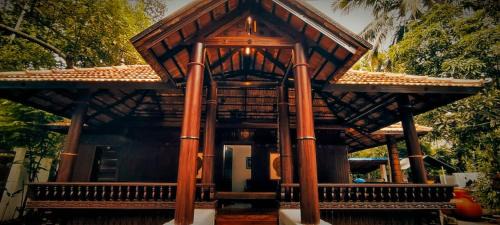 Poovar Apartment | Periyaveettil Heritage