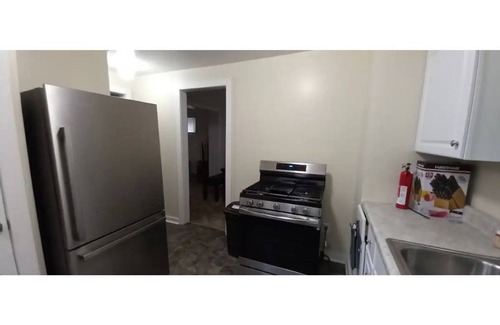 Akron House | Pet friendly home near Cuyahoga and Portage Lakes sleeps 10, 3 decks & fire pit.