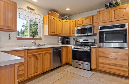 Kalispell House | Pet Friendly Home with Fishing Access and Fire Pit