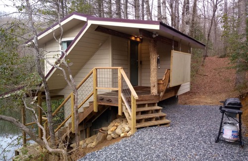 Brevard Cabin | Pet friendly Little House, Fire pit, paddle boat, 2 hammocks, porch swing, grill