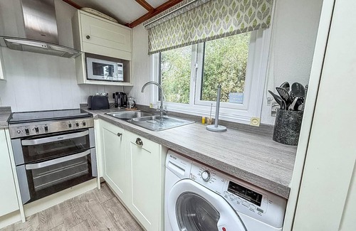 Corton House | Pet friendly, luxury lodge with decking in Suffolk near the beach ref 32108A