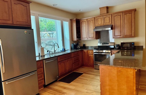 North Creek Apartment | Pet-friendly MIL apartment with fenced play area for dogs in quiet neighborhood
