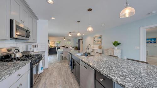 Town Bank House | Pet-Friendly Pool Bayside Coastal Cottage