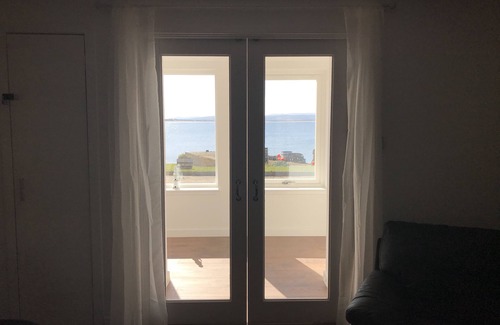 Portmahomack Cottage | PetFriendly-Beachfront-SunsetFacingSunPorch-Garden
