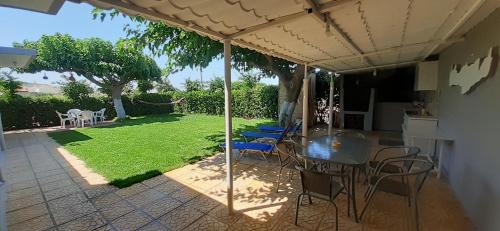 Faistos House | Petrakis Afrathias garden house