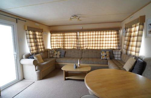 Heacham Ski Chalet | pets go free family 3 Bed Caravan with Decking