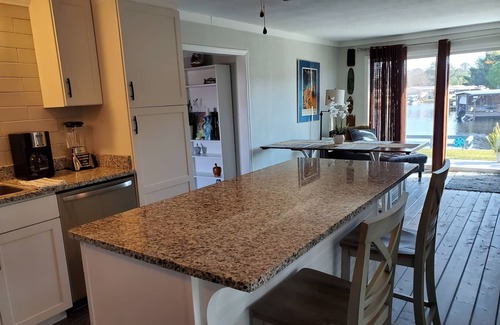 Tavares House | PETS STAY FREE Canal Front 3 bed/2 bath single family ample parking