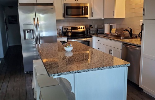 Tavares House | PETS STAY FREE Canal Front 3 bed/2 bath single family ample parking