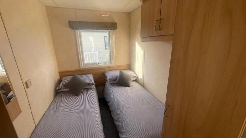 Chapel Saint Leonards Apartment | PG69 Golden Palm 8 Berth Caravan with Decking