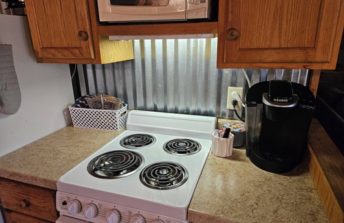 Lincoln Cabin | Picturesque 3-bedroom Cabin Hideaway in a wooded setting with a lake view!
