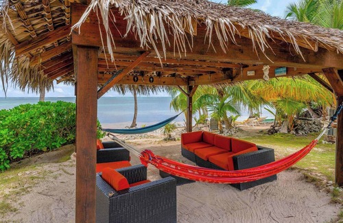 Breakers House | Piece of Mine Blue: Beach Cottage on 200-feet of Shoreline w/Screened Porch, Snorkeling + Hammocks