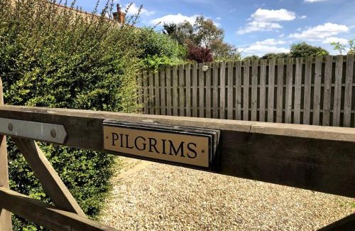 Stanhoe House | Pilgrims - Traditional flint cottage with open fire