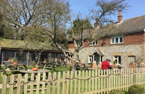 Stanhoe House | Pilgrims - Traditional flint cottage with open fire