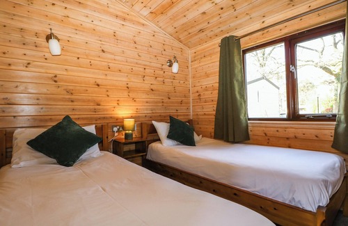New Forest District Cottage | PINECONE CABIN, pet friendly, with pool in Godshill, Hampshire