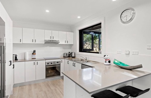 Culburra Beach House | Pipers Spot - Pet Friendly - Fireplace with Swimming Pool