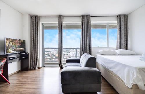 Osasco Apartment | Piscina aquecida Vista Romântica Estacionamento