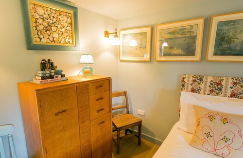 Rhoscolyn Cottage | Plas Esgob - an on the beach that sleeps 8 guests in 4 bedrooms