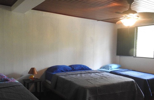 Parrita House | Playa Palo Seco, Parrita, Costa Rica. Tropical oceanfront three bedroom home.