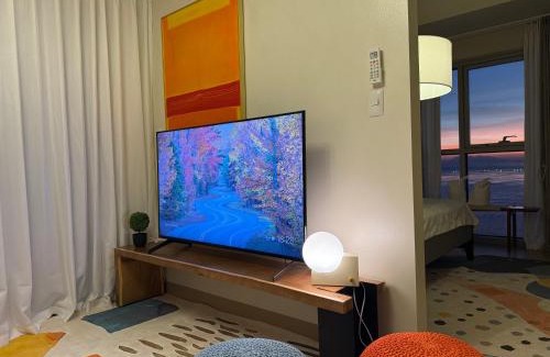 Tambo Apartment | Playful 1BR With Magnificant Bayview Garden View Near Okada, Solaire, Aiports