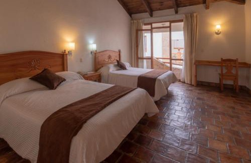 Zona Centro Hotel | Plaza Magnolias Suites