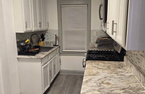 East Orange House | Pleasant 3-bedroom home in East Orange, NJ located close to the train stations.