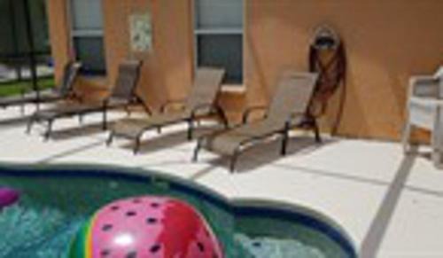 Sandy Ridge House | Pluto's Palace Florida Villa South Facing Pool