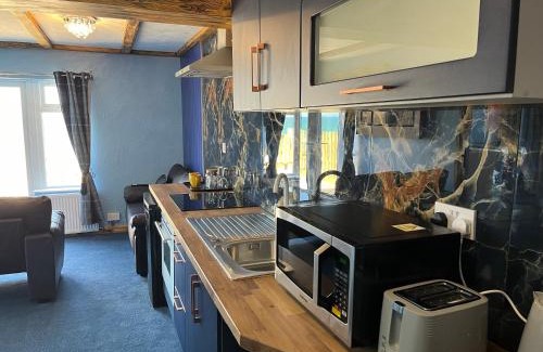 Bacton Ski Chalet | Poachers Pocket Seaview