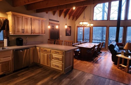 Cresco Ski Chalet | Pocono Private lake setting with, Hot Tub, boat dock, fishing, Swimming, Canoe