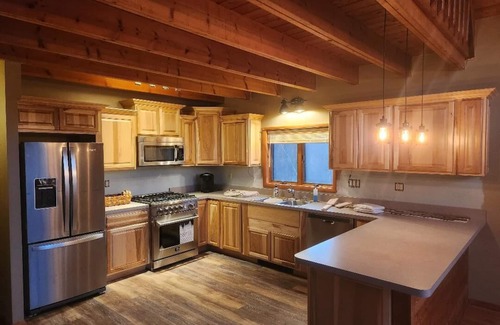 Cresco Ski Chalet | Pocono Private lake setting with, Hot Tub, boat dock, fishing, Swimming, Canoe