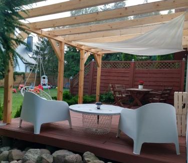 gmina Wolin House | "Pod Świerkami" domek letniskowy Kubuś 2 Wisełka-Domek z kominkiem- 3 sypialnie, salon, kuchnia