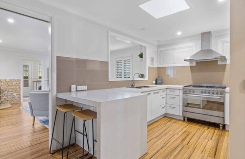 Bateau Bay House | Poets Corner Retreat- Indoor Fireplace