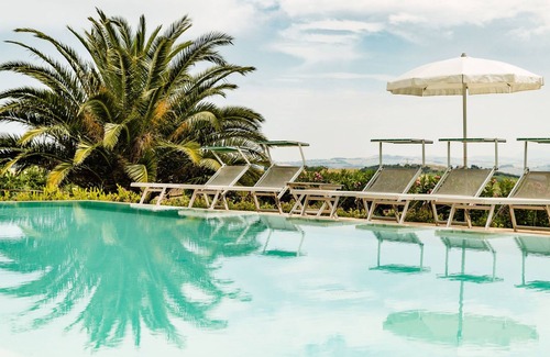 Monte San Vito House | Poggio Antico - Suites and Breakfast