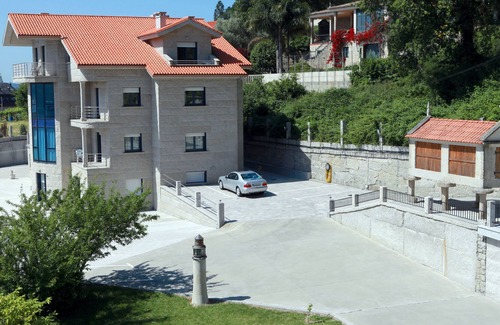 Raxo Apartment | Pool, garden, playground, tennis court and barbecue. 400 m. the beach