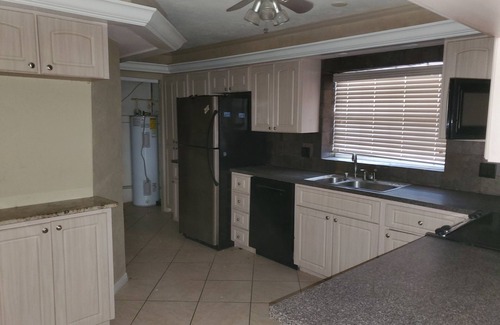Cypress Lake House | Pool home 3 bed/3 bath with tiki bar & hot tub