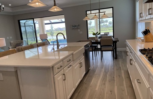 Sarasota House | Pool House Overlooking Lake on Skye Ranch